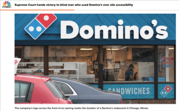 A screenshot of the CNBC article titled "Supreme Court hands victory to blind man who sued Domino's over site accessibility" with the front of a Domino's restraunt.